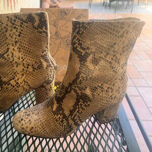Women’s faux snake skin fashion boots with 3 inch heel - brand: free people